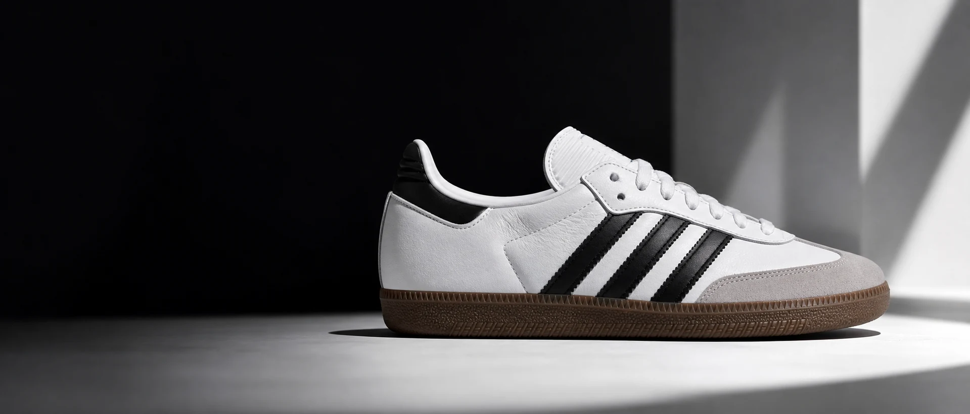White adidas Samba OG shoe with black stripes