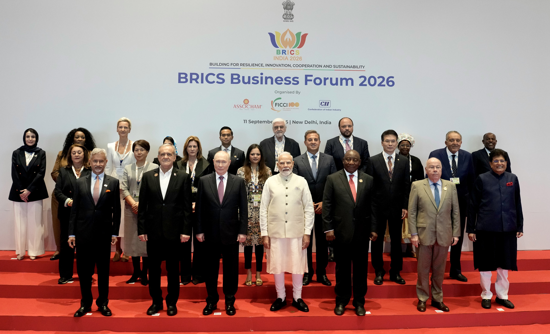 Narendra Modi and participants in a group photograph at the BRICS Business Forum 2026