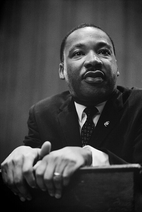 Martin Luther King Jr. at a press conference.